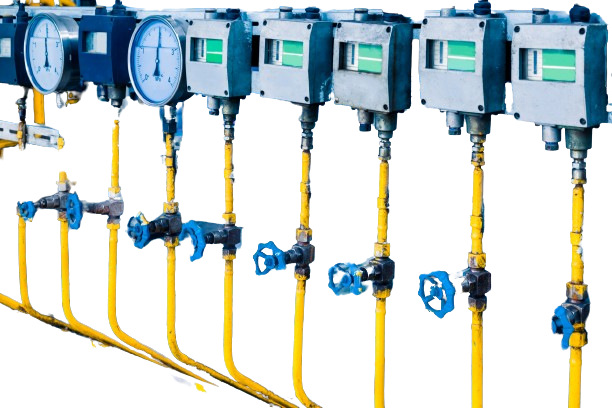 borakengineering Soluions An image of a flow transmitter installed within a pipeline, featuring digital interfaces and cables, designed for measuring and transmitting flow data in an industrial environment.